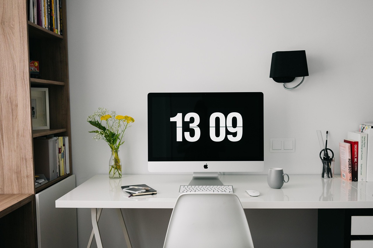 Desk with laptop in a quiet workspace used for nightly pacing reviews